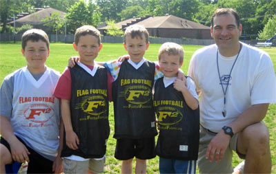 Mark Catlett posing with kids